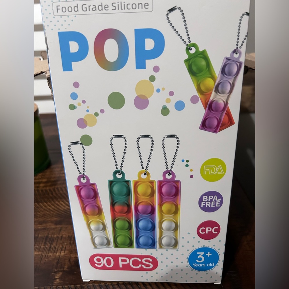 NIB Mini Keychain pop toys 90 pc
